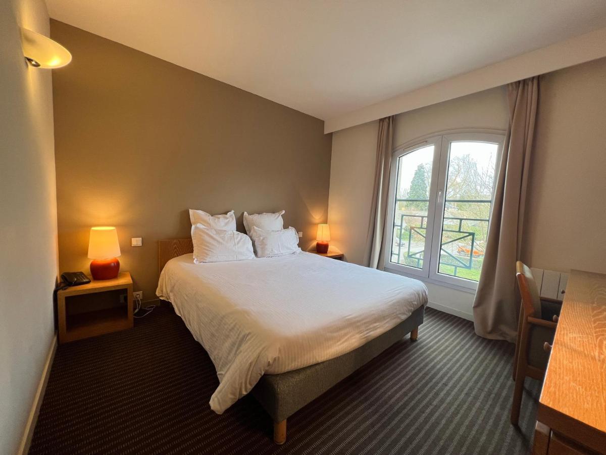 Le Pre Saint Germain Hotel Louviers Bagian luar foto